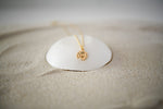 Gold Sunburst Pendant Necklace